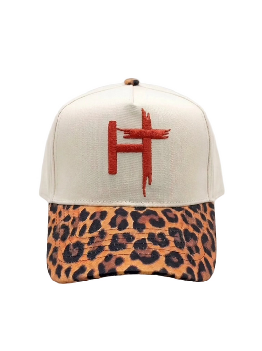 Cap with beige top and leopard print bottom on a white background